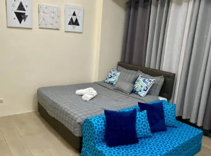 公寓式飯店 Cozy Hideaway At 81 Newport Blvd Walk To Naia T3 Casinos And Mall Own Parking Pool Gym Balcony And Kitchen 马尼拉